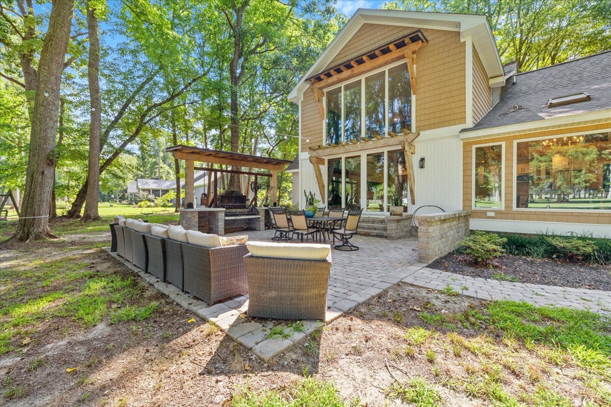 Backyard view showing patio and rear of home
